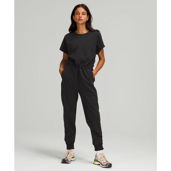 Lululemon Stretch Travel Woven Jumpsuit size 14 Black Athletic - Picture 1 of 15